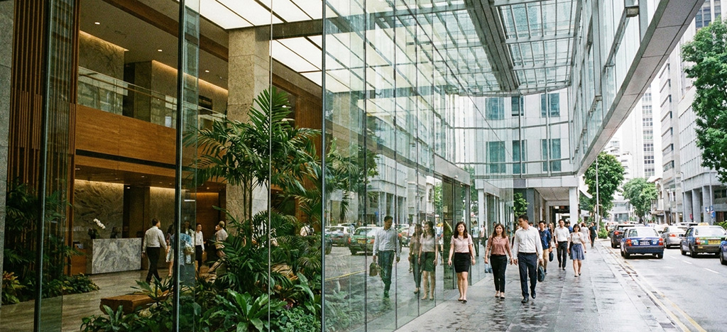 Modern Singapore CBD office building representing Manchester's physical presence in the city